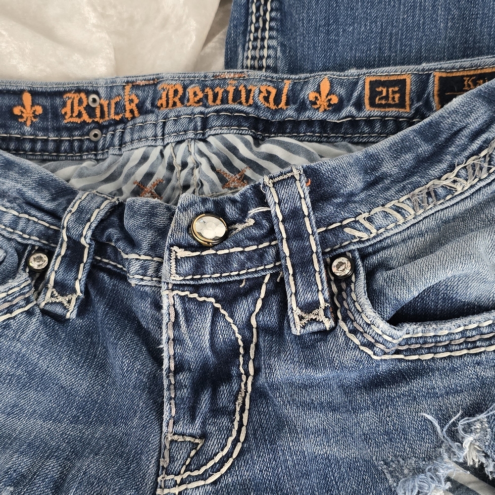 Rock Revival Blue Jeans with Premium Denim and Decorative Stitching